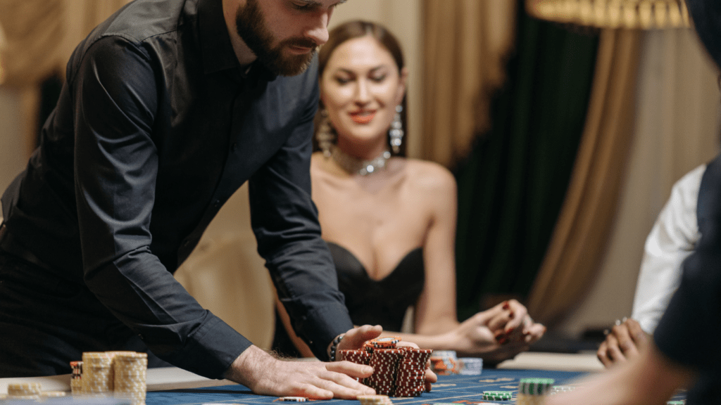 A man placing his bet at a casino