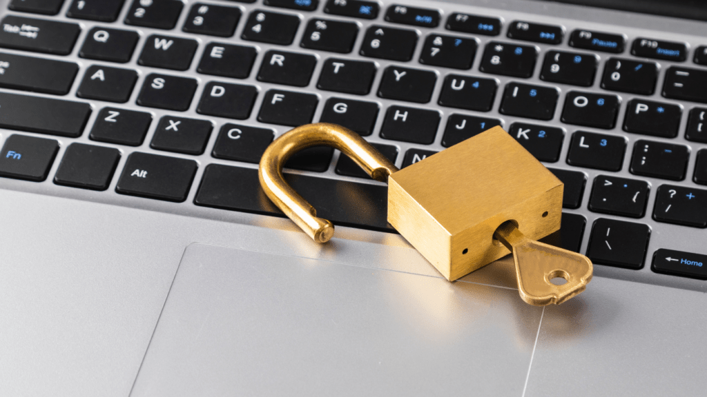 a padlock on top of a laptop computer