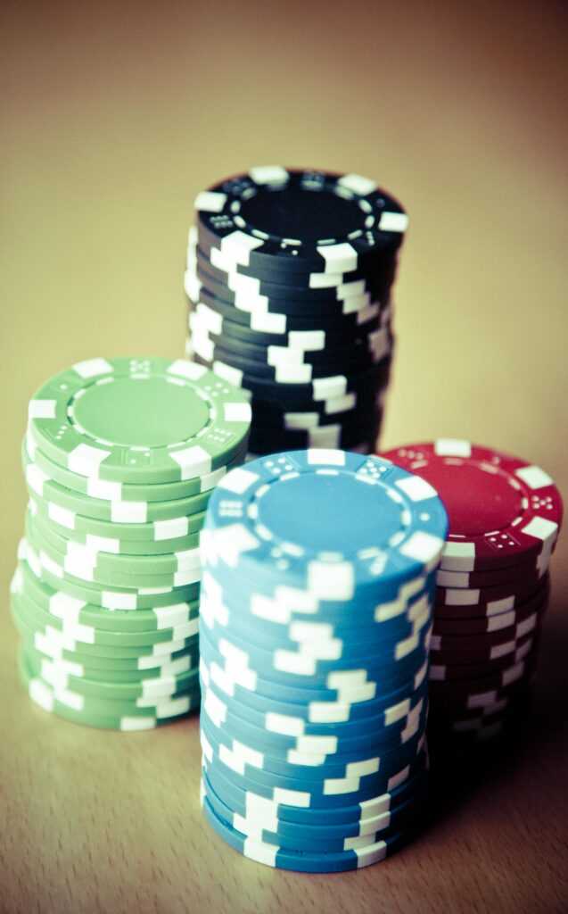 Vibrant stacks of casino chips, perfect for poker or gambling themes.